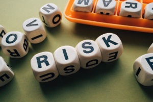"Risk" spelled out with dice