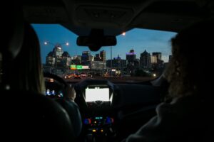 Driving on a city highway at dusk.
