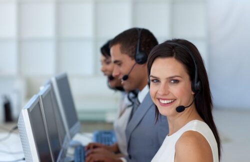 Insurance agents helping callers get the right kind of auto insurance.