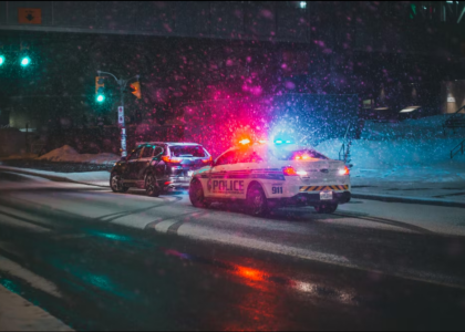 Police car pulls over suspected DUI driver who will need Minnesota SR22 insurance.